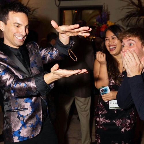 Tetro performing a levitation illusion at an upscale event in Los Angeles