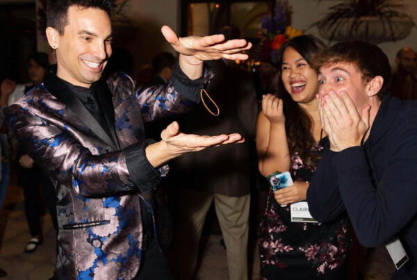 Tetro performing a levitation illusion at an upscale event in Los Angeles